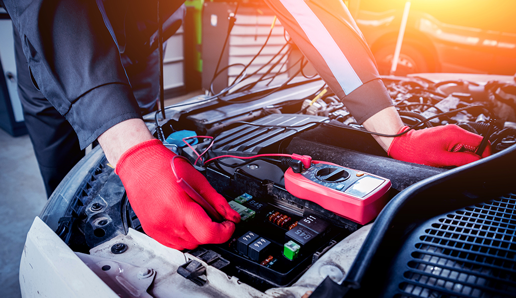 A vehicle's electrical system is being checked