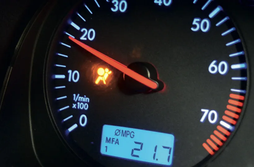 Check engine light on dashboard