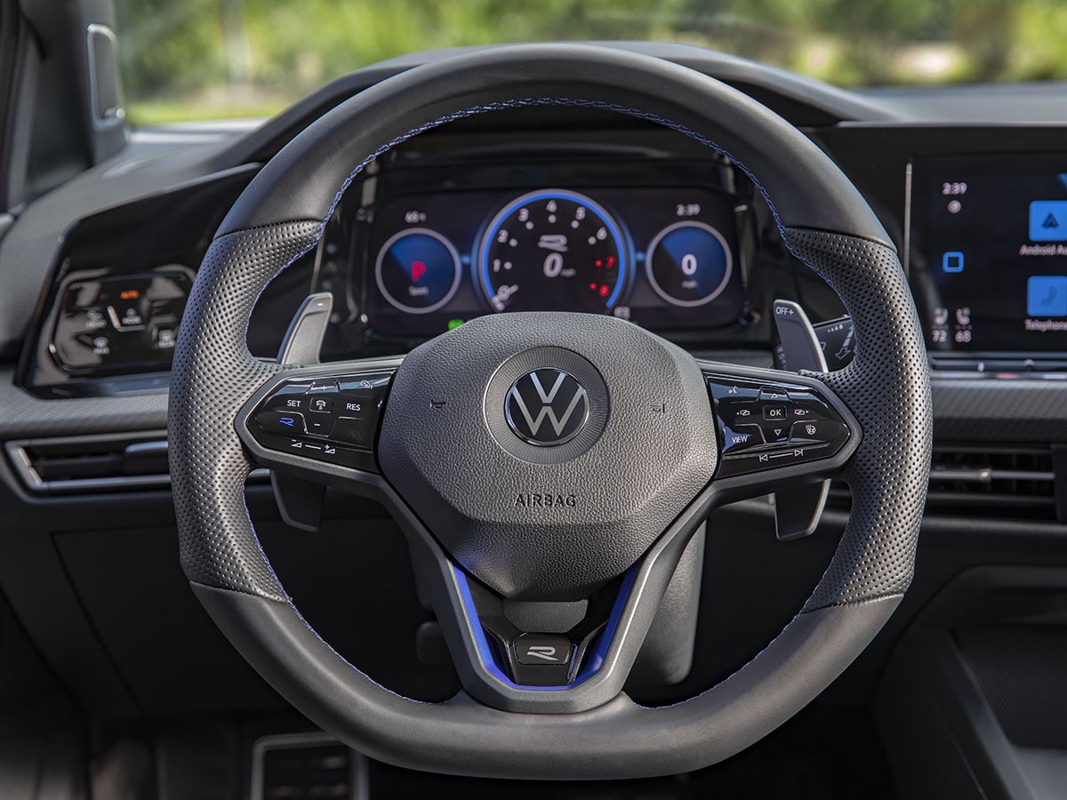 Closeup to another steering wheel that has airbag text on it