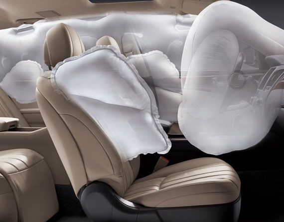 The inside of a vehicle with blown up airbags
