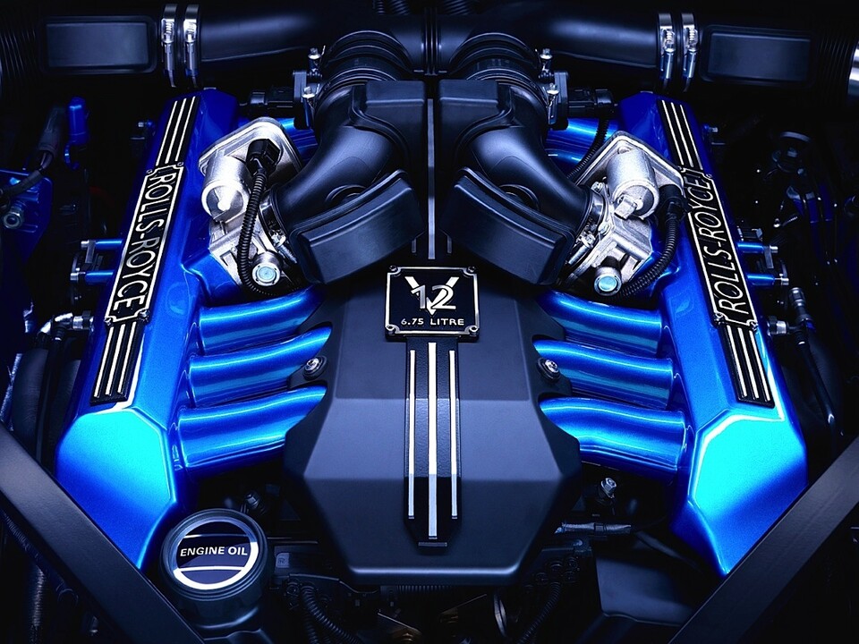 A bright blue V8 engine