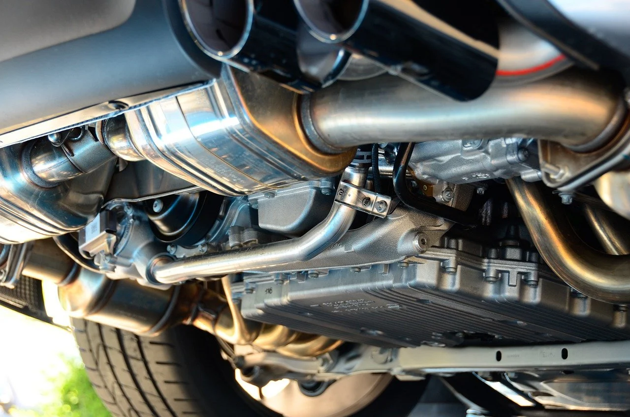 Underside of a vehicle displaying the exhaust system