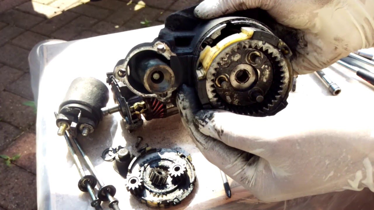 The parts of a starter being cleaned