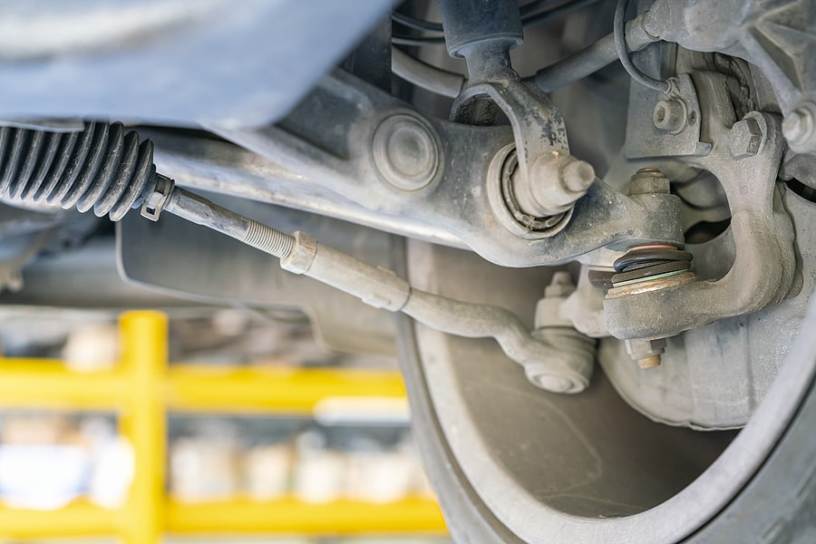 The underside of a vehicle's wheel showing the ball joint