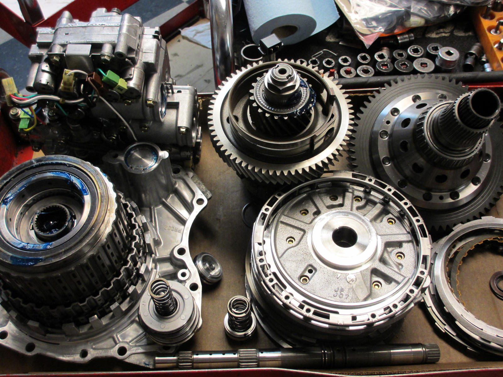 A disassembled transmission's parts
