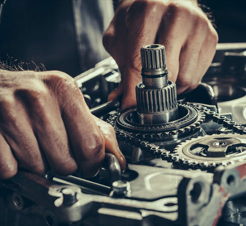 A transmission being serviced