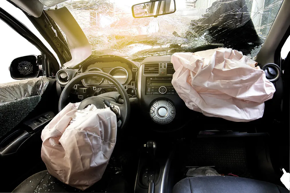 ASE-certified technician performing airbag and SRS system diagnostics on a vehicle dashboard in Virginia Beach