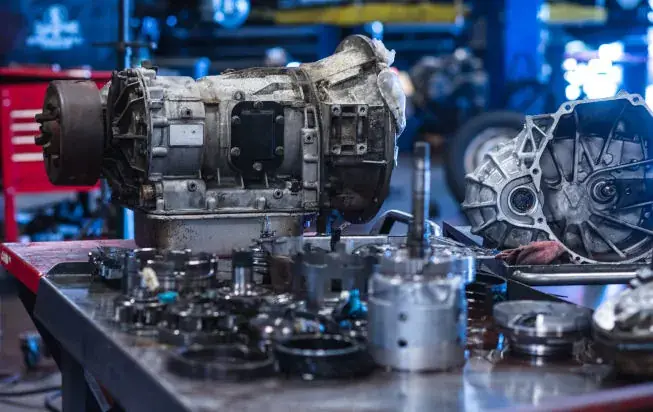 Transmission system being serviced with fluid change at Beach Auto & Transmission Repair
